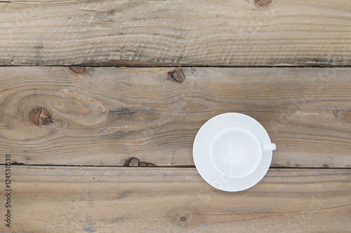 Empty white coffee cup on old wood table ,Top view with copy spa
