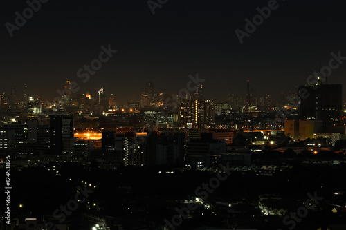 Wide angle of city scape at night scene © bookybuggy