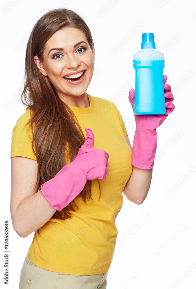 Smiling woman holding bottle of chemistry for cleaning house sho Smiling woman holding bottle of chemistry for cleaning house sho