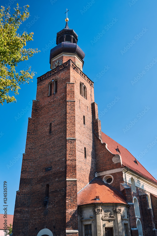 Fototapeta premium Church tower in the Gothic style in Leszno.