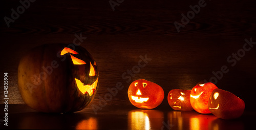 Still life of pumpkins to celebrate halloween with funny faces