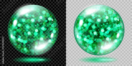 Two transparent spheres filled with green glowing sparkles with bokeh effect. Spheres with green sparkles, glares and shadows. For use on dark and light background. Transparency only in vector file