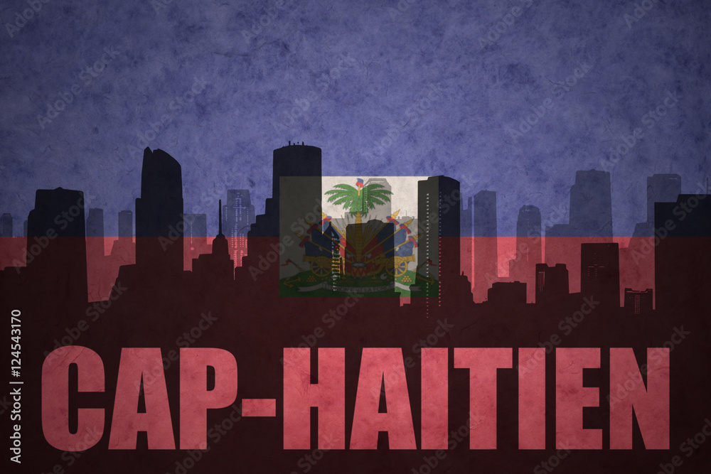 abstract silhouette of the city with text Cap-Haitien at the vintage haitian flag