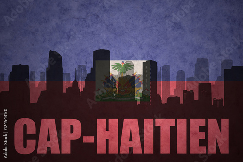 abstract silhouette of the city with text Cap-Haitien at the vintage haitian flag