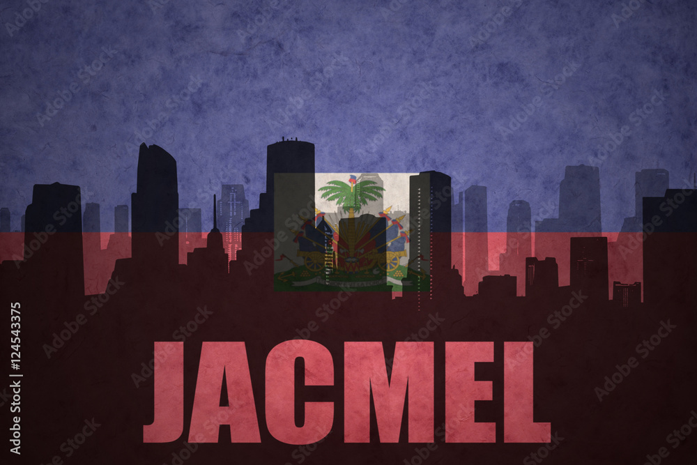 abstract silhouette of the city with text Jacmel at the vintage haitian flag