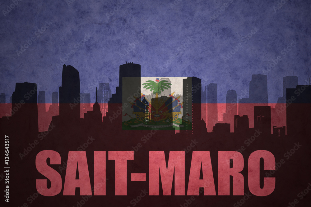 abstract silhouette of the city with text Saint-Marc at the vintage haitian flag