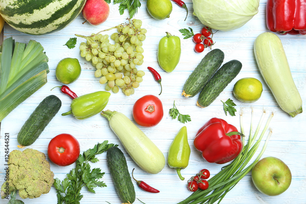 Ripe fruits and vegetables on wooden table Ripe fruits and vegetables on wooden table