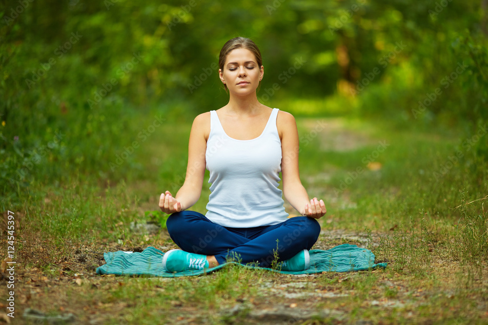 Woman portrait in yoga pose Woman portrait in yoga pose