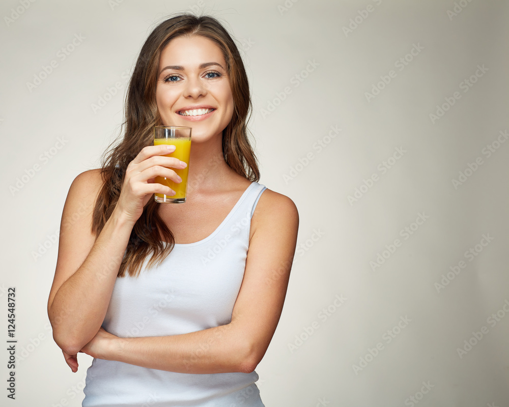 smiling woman drinking orange juice with glass smiling woman drinking orange juice with glass