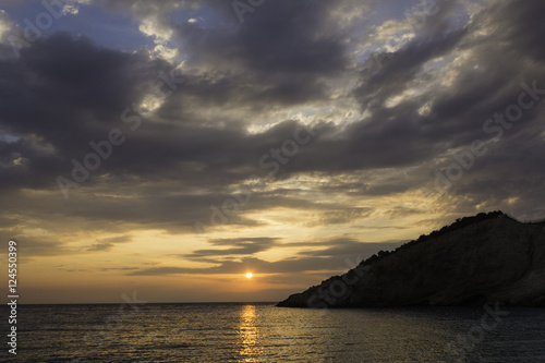 Sunset over Porto Katsiki beach - Lefkada island, Greece © akarb