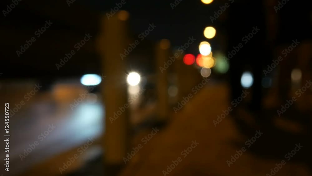 Defocused night traffic lights with blur people walk along street Bangkok Thailand 4K UHD 25fps Defocused night traffic lights with blur people walk along street Bangkok Thailand 4K UHD 25fps