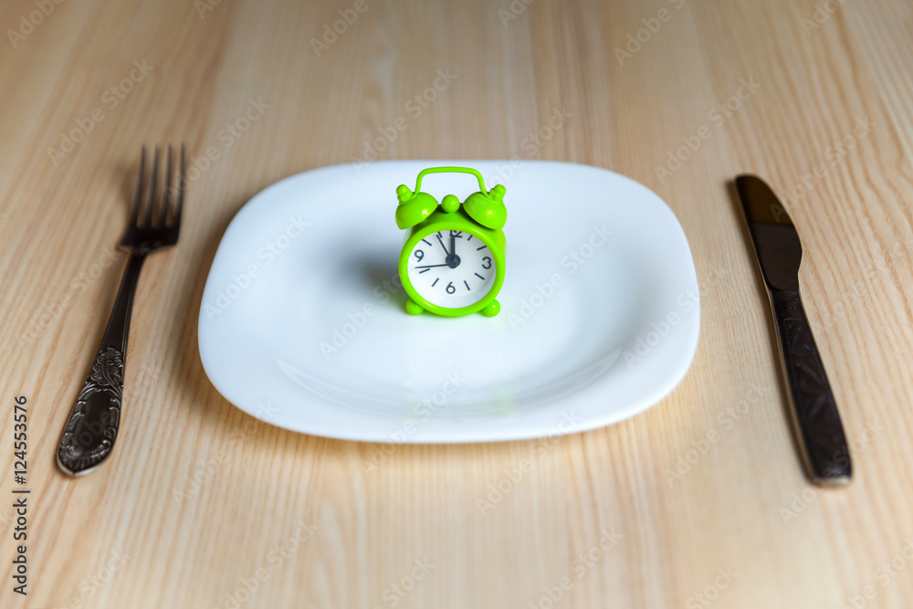 Alarm clock and utensils Alarm clock and utensils