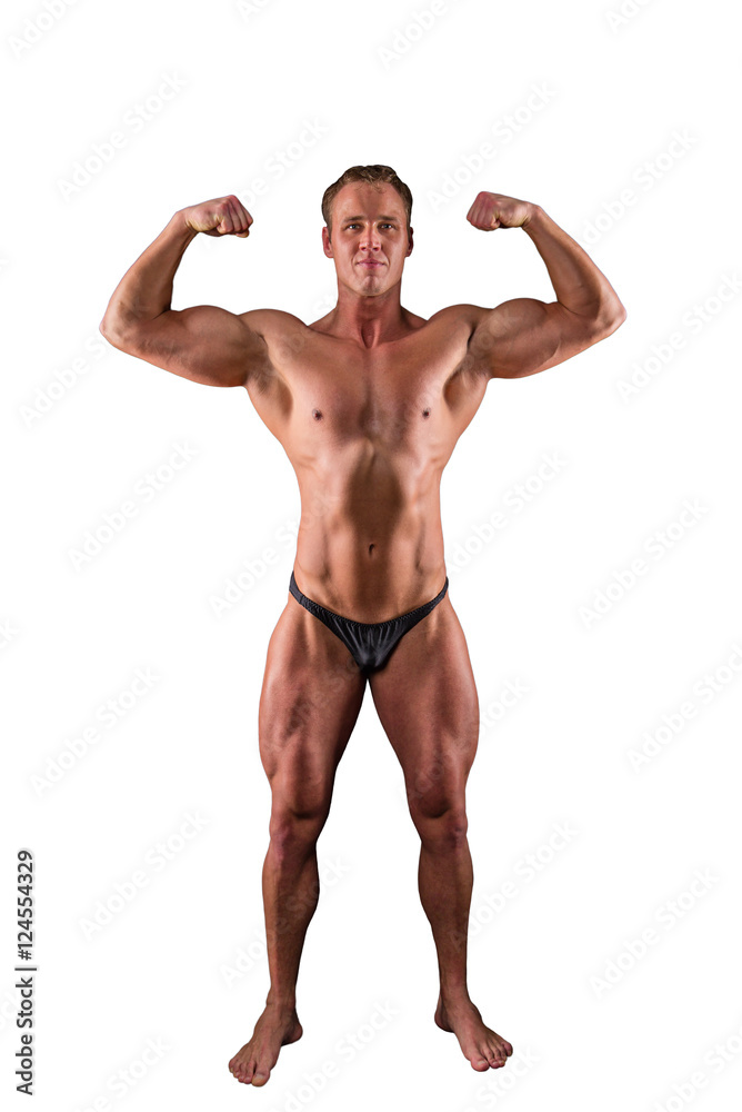 Handsome muscular athletic man posing isolated on a white background Handsome muscular athletic man posing isolated on a white background