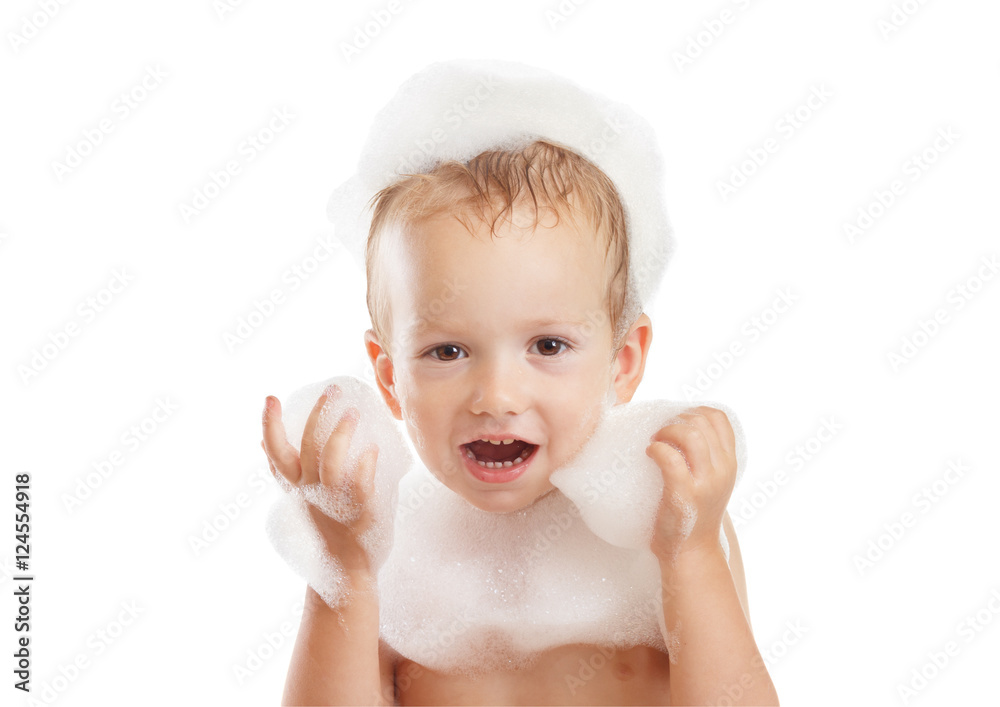 Baby boy with soap foam or shampoo