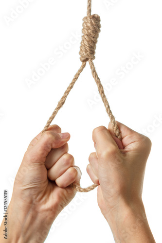 Hands holding a loop of rough rope isolate on white