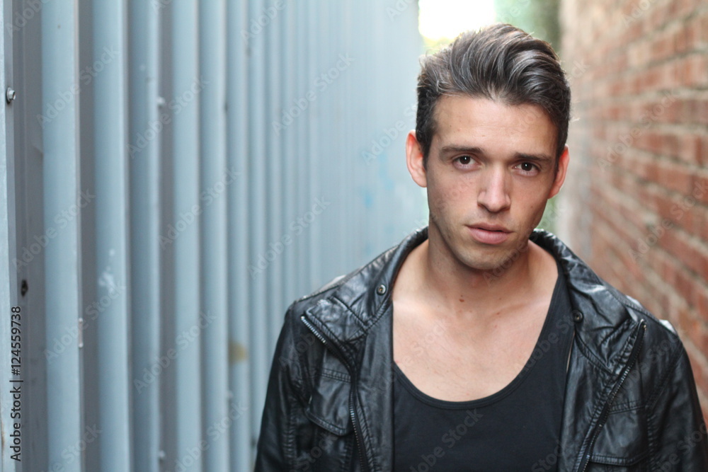 Portrait of a young casual man looking at the camera Portrait of a young casual man looking at the camera