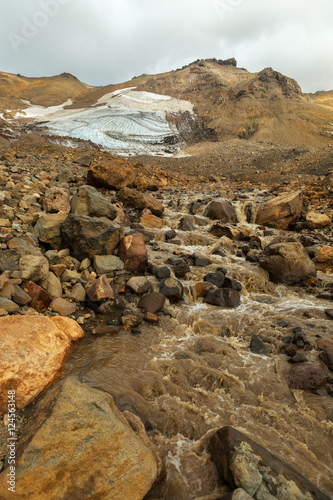 Stream from melting of glaciers on the active volcano Mutnovsky.