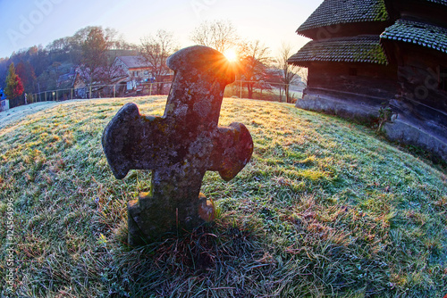 Cross near the wooden church photo