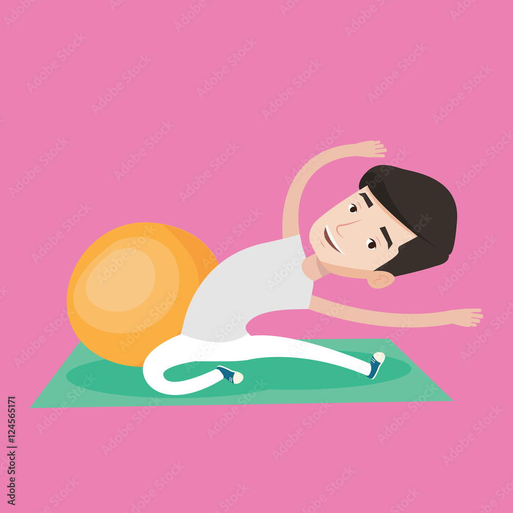 Young man exercising with fitball. Young man exercising with fitball.