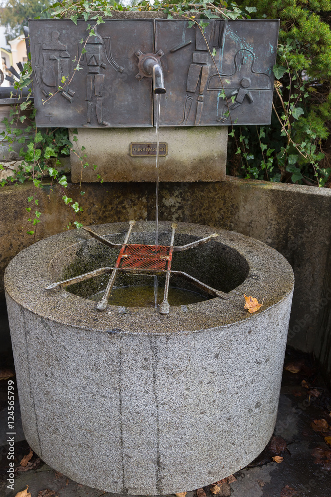 Public free clean drinking water from antique faucet in Kitzbuhel, Austria,  Europe. Water flows from a tap. Word Trink Wasser is German words for drinking  water. Stock Photo | Adobe Stock