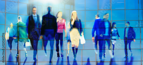 Business people walking illustration. Blurred silhouettes against modern glass architecture and blue sky