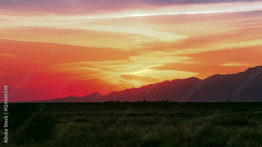 Steppe with dry plants at sunset sky in Altyn Emel national park, Kazakhstan, Central Asia. 4K TimeLapse - September 2016, Almaty and Astana, Kazakhstan Steppe with dry plants at sunset sky in Altyn Emel national park, Kazakhstan, Central Asia. 4K TimeLapse - September 2016, Almaty and Astana, Kazakhstan