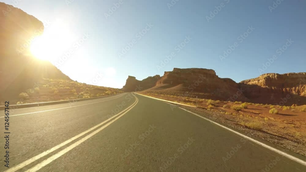 Arizona desert dawn car mount driving on Lees Ferry Road in Glen Canyon National Recreation Area.