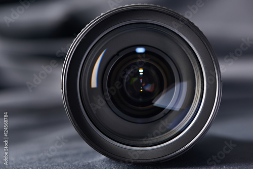 Photo lens front view on blurred © Sergey Ryzhov