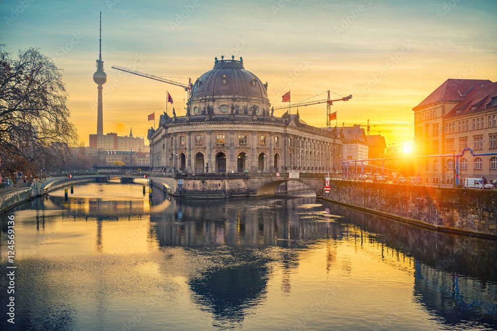 Museum Island on Spree river and TV tower in the background at sunrise, Berlin, Germany
