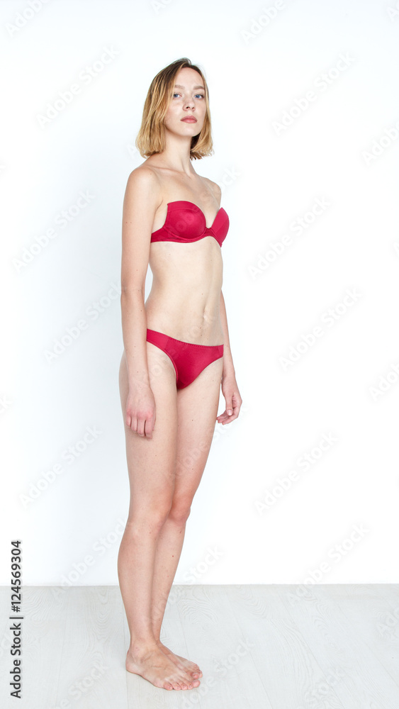 Obraz premium Standard model tests of young pretty woman on a white background