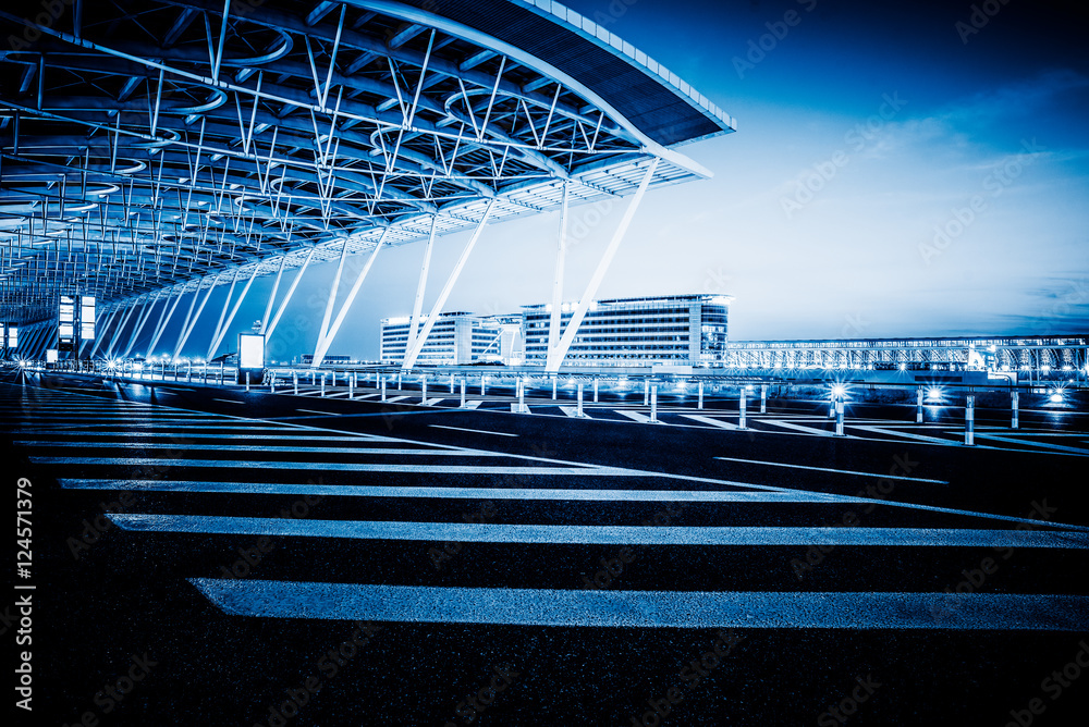 Fototapeta premium urban traffic road with cityscape at night in China.