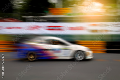 Race car racing on speed track with motion blur © abimagestudio