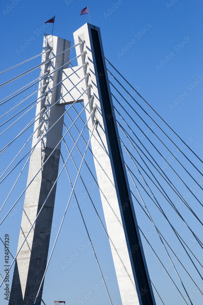 Construction of a new overhead bridge over the River with the flags of the European Union Construction of a new overhead bridge over the River with the flags of the European Union