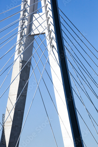 Fototapeta Naklejka Na Ścianę i Meble -  Construction of a new overhead bridge over the River with the flags of the European Union