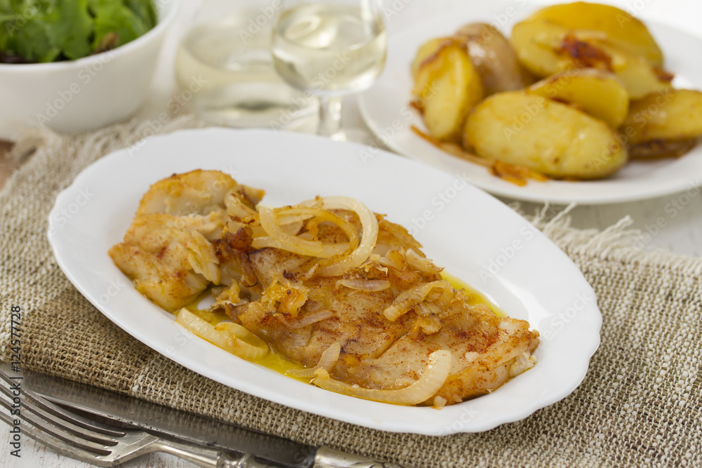 cod fish with potato on white dish cod fish with potato on white dish