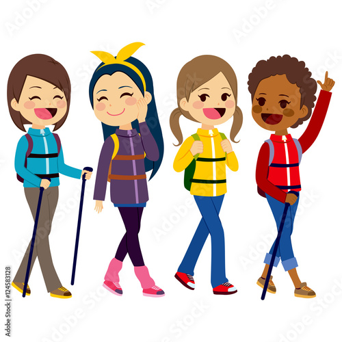 Happy hiking girls friends from diverse ethnicities enjoying climbing mountain
