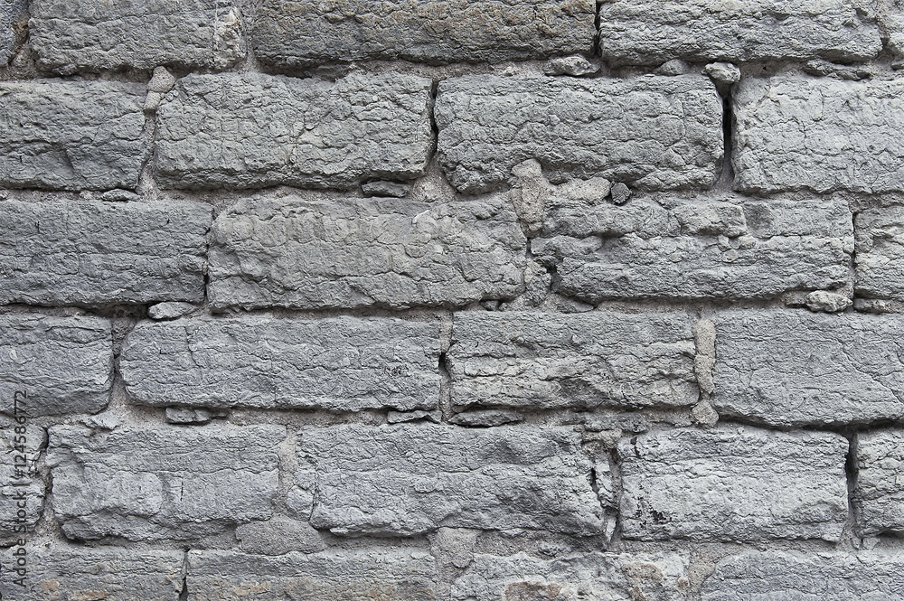 Fototapeta premium Old grey stone wall background texture