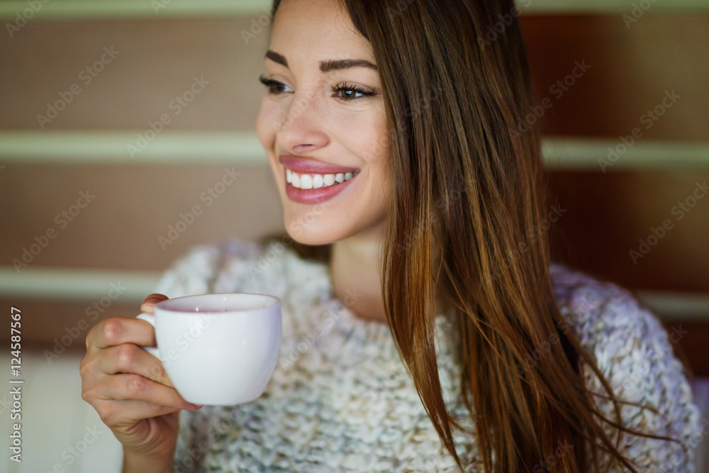 Beautiful woman drinking coffee Beautiful woman drinking coffee