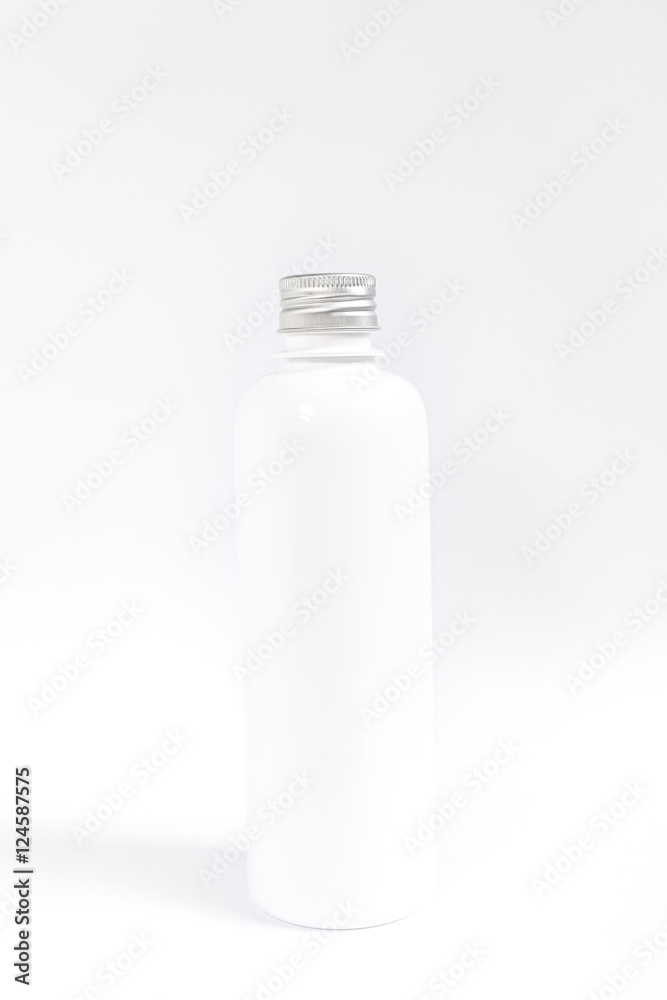 close up of a white bottle on white background close up of a white bottle on white background