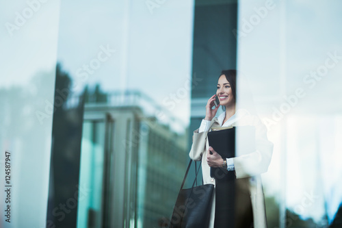 Company CEO busy talking on phone