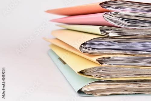 paperwork Stacked files on isolated background photo