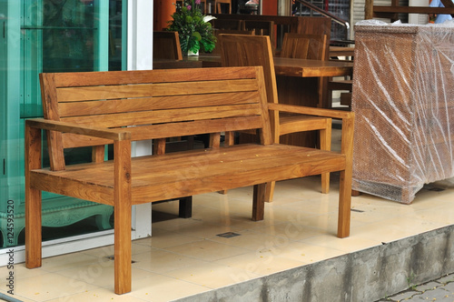 Long wooden bench, interior furniture © ZhouEka