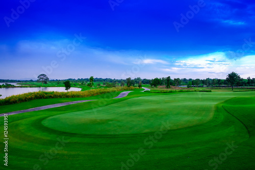 Landscape beautisul green golf links and blue sky