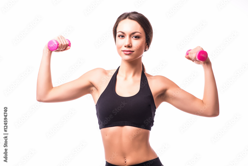 Young woman is exercising with dumbbells Young woman is exercising with dumbbells