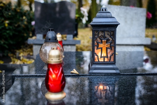 Candles burning at a cemetery