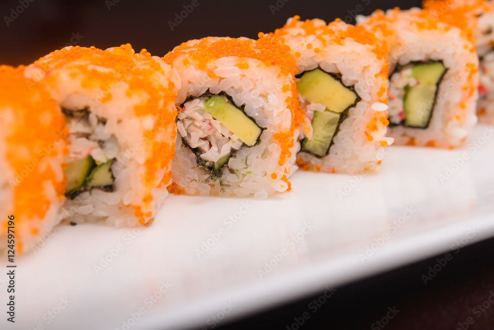 Sushi rolls on a white plate Sushi rolls on a white plate