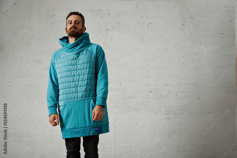 Man in a light blue padded hoodie