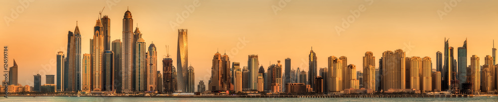 Panoramic view of Dubai Marina bay with cloudy sky on sunset, Dubai, UAE.
