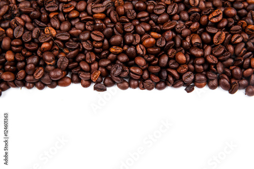 Frame of roasted coffee beans isolated on white