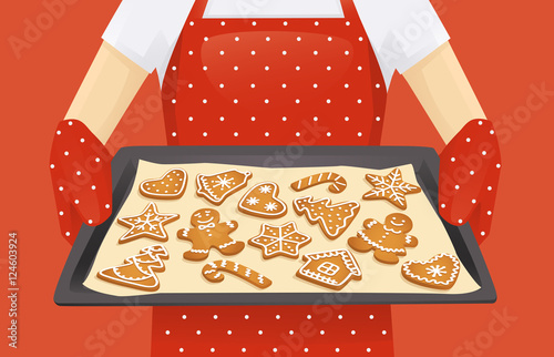 Baking tray with christmas homemade gingerbread cookies background